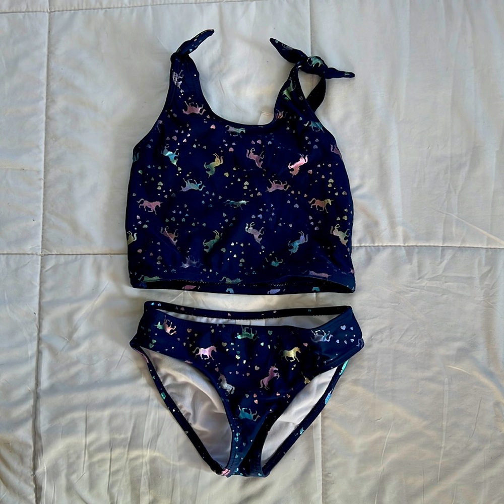 Little girls size 4/5 tankini. Navy with unicorn print. Worn one time only.